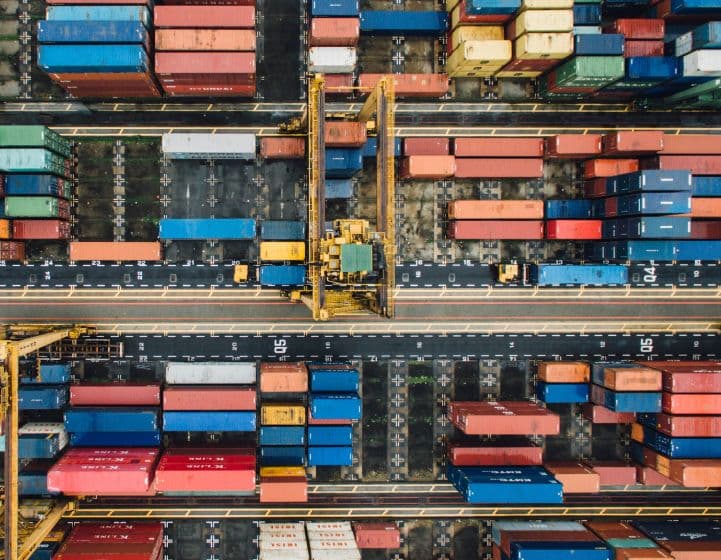 Aerial view of a shipyard with shipping containers